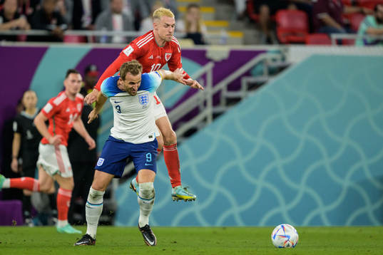 Harry Kane of England and Aaron Ramsey of Wales