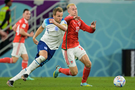 Harry Kane of England and Aaron Ramsey of Wales