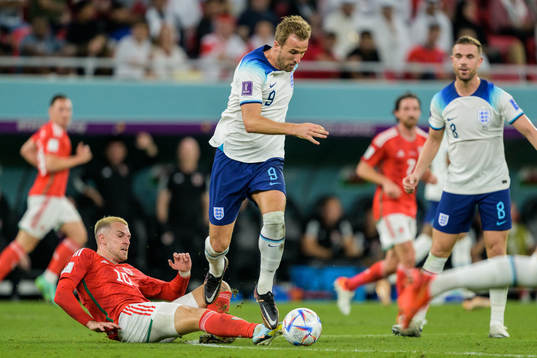 Aaron Ramsey of Wales and Harry Kane of England