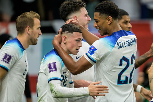 Phil Foden of England celebrate with Jude Bellingham