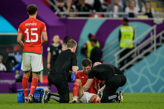 Ben Davies of Wales in pain