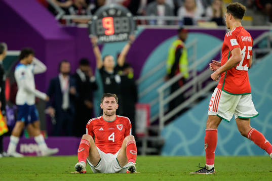 Ben Davies of Wales looks dejected