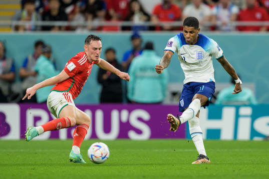 Connor Roberts of Wales and Marcus Rashford of England