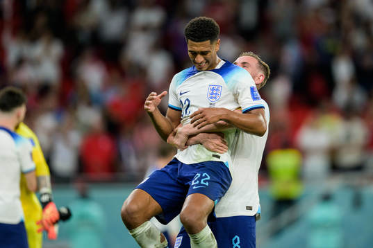 Jude Bellinghamand Jordan Henderson of England