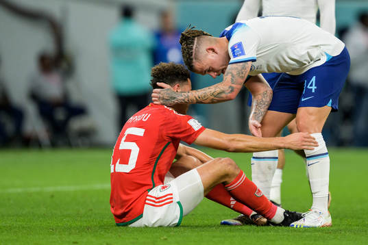 Ethan Ampadu of Wales and Kalvin Phillips of England