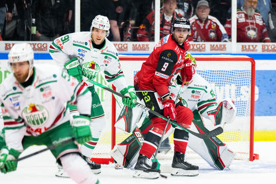 Rögles Adam Tambellini och Malmö Redhawks Kim Rosdahl