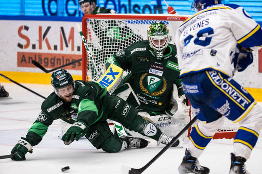 Färjestads Axel Bergkvist och Färjestads målvakt Dennis