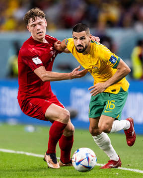 Andreas Skov Olsen of Denmark and Aziz Behich of Australia