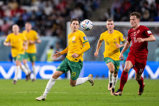 Craig Goodwin of Australia and Andreas Skov Olsen of Denmark