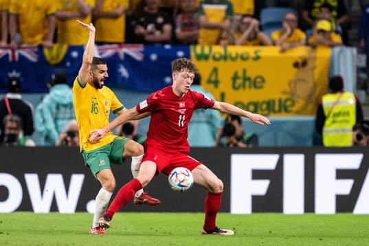 Aziz Behich of Australia and Andreas Skov Olsen of Denmark