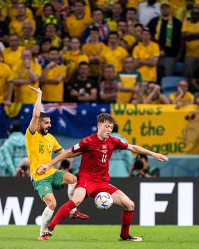 Aziz Behich of Australia and Andreas Skov Olsen of Denmark
