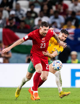 Pierre-Emile Højbjerg of Denmark and Mathew Leckie of