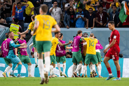 Mathew Leckie of Australia celebrate with team mates
