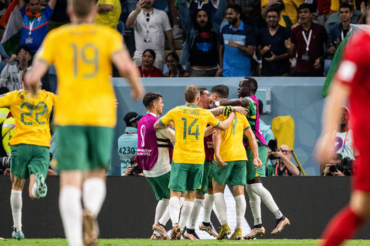 Mathew Leckie of Australia celebrate with team mates