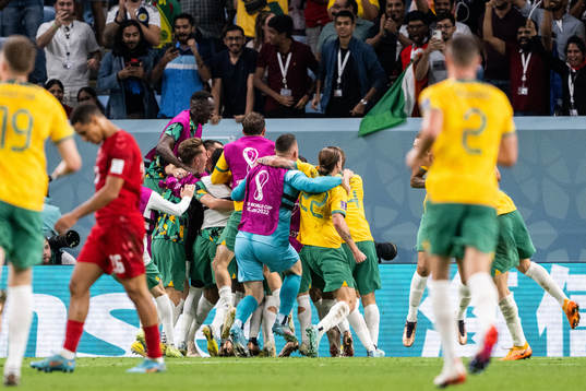 Mathew Leckie of Australia celebrate with team mates