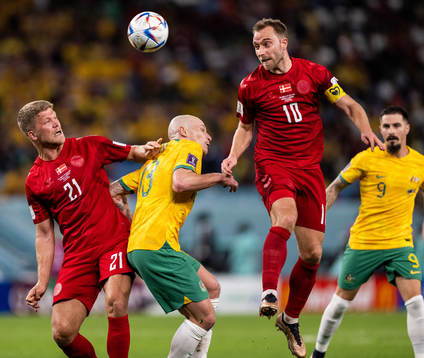 Andreas Cornelius and Christian Eriksen of Denmark against