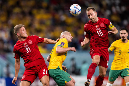 Andreas Cornelius and Christian Eriksen of Denmark against