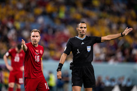 Christian Eriksen of Denmark reacts against referee