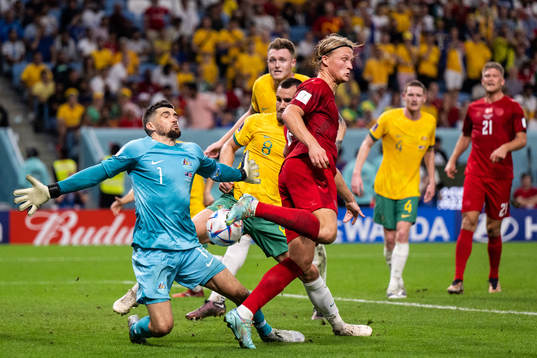 Goalkeeper Mathew Ryan of Australia makes a save against