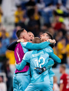 Goalkeeper Andrew Redmayne of Australia celebrate with team