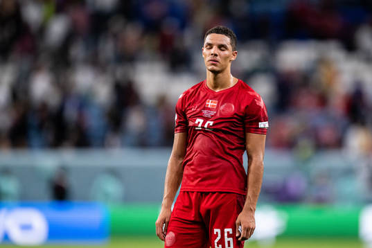 Alexander Bah of Denmark looks dejected