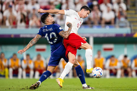 Nicolas Otamendi of Argentina and Robert Lewandowski of