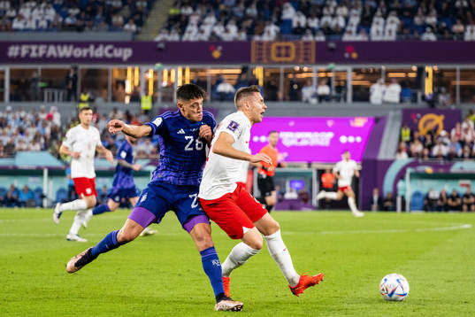 Nahuel Molina of Argentina and Przemyslaw Frankowski of