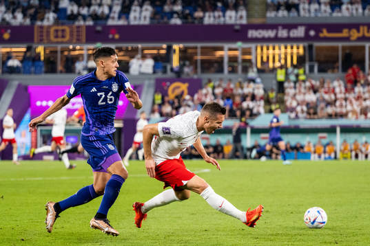 Nahuel Molina of Argentina and Przemyslaw Frankowski of