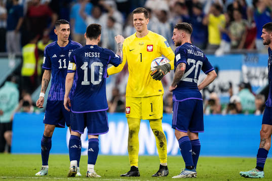 Goalkeeper Wojciech Szczesny of Poland and Lionel Messi of