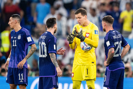 Goalkeeper Wojciech Szczesny of Poland and Lionel Messi of