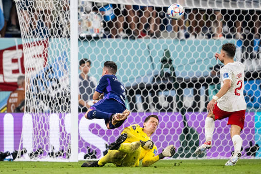 Nicolas Tagliafico of Argentina and goalkeeper Wojciech