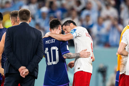 Lionel Messi of Argentina and Robert Lewandowski of Poland