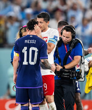 Lionel Messi of Argentina and Robert Lewandowski of Poland