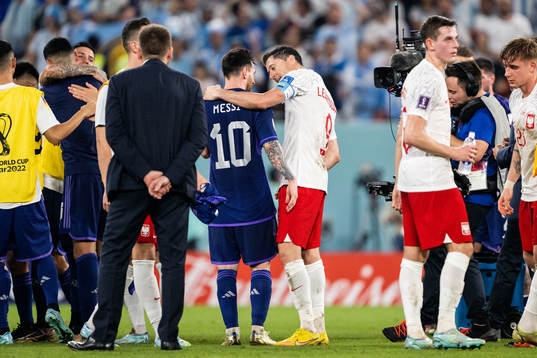 Lionel Messi of Argentina and Robert Lewandowski of Poland