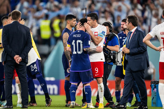 Lionel Messi of Argentina and Robert Lewandowski of Poland