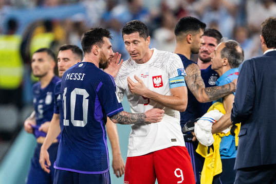 Lionel Messi of Argentina and Robert Lewandowski of Poland