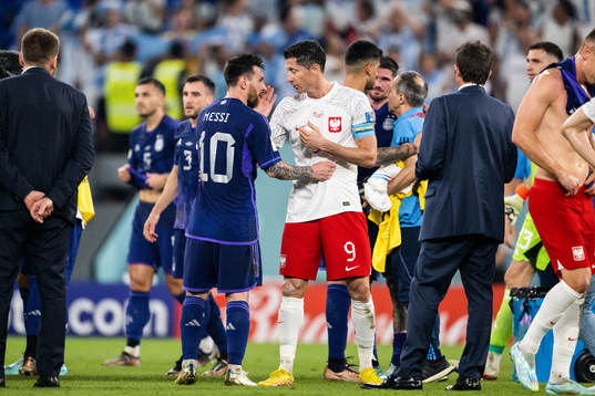 Lionel Messi of Argentina and Robert Lewandowski of Poland