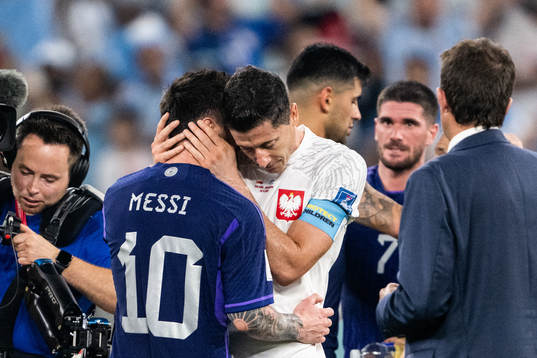 Lionel Messi of Argentina and Robert Lewandowski of Poland