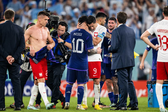 Lionel Messi of Argentina and Robert Lewandowski of Poland