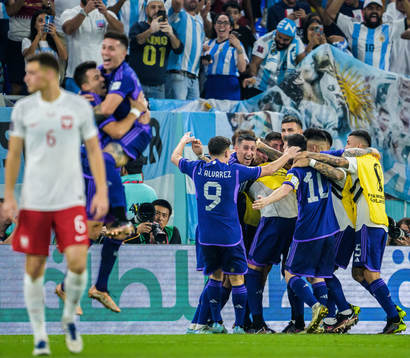 Players of Argentina celebrate the 0-1 goal from Alexis Mac