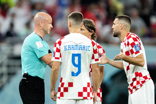 Luka Modric, Andrej Kramaric and Mateo Kovacic of Croatia