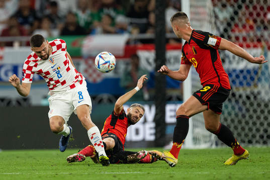 Mateo Kovacic of Croatia against Yannick Carrasco and