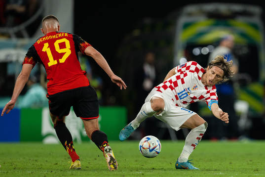 Leander Dendoncker of Belgium and Luka Modric of Croatia