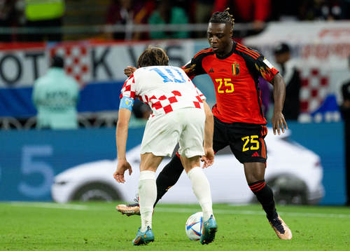 Luka Modric of Croatia and Jeremy Doku of Belgium