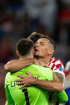 goalkeeper Dominik Livakovic and Dejan Lovren of Croatia