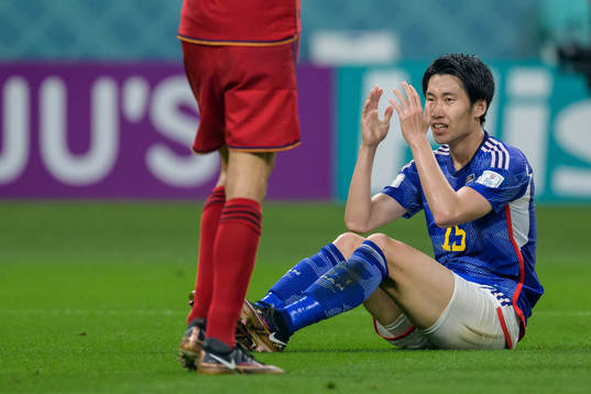 Daichi Kamada of Japan looks dejected