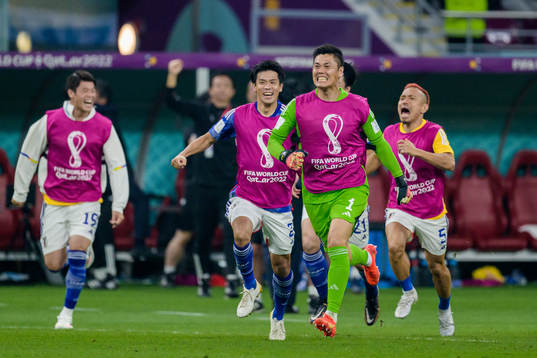 goalkeeper Eiji Kawashima of Japan celebrates