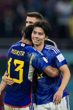 Hidemasa Morita and Ao Tanaka of Japan celebrate