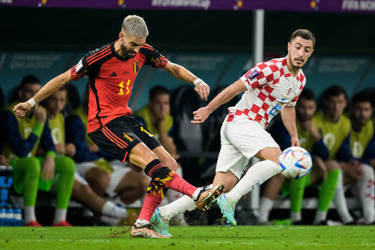 Yannick Carrasco of Belgium and Josip Juranovic of Croatia