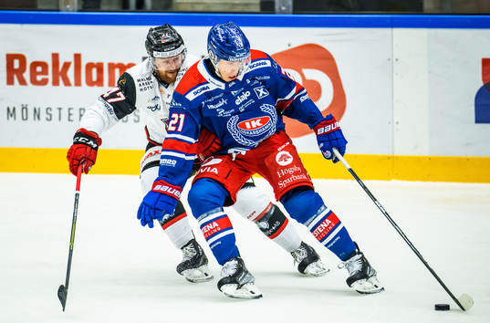 Malmö Redhawks Joakim Ryan och Oskarshamns Myles Powell